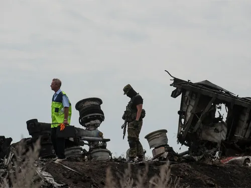 Мир чтит память погибших рейсf MH17 и требует трибунала