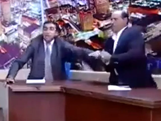 Иордания: депутат чуть не застрелил оппонента в прямом эфире. ВИДЕО