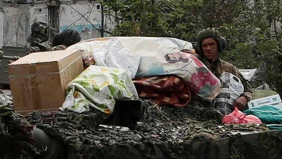 На фотографии российского танка в Попасной узнала свои вещи украинская беженка