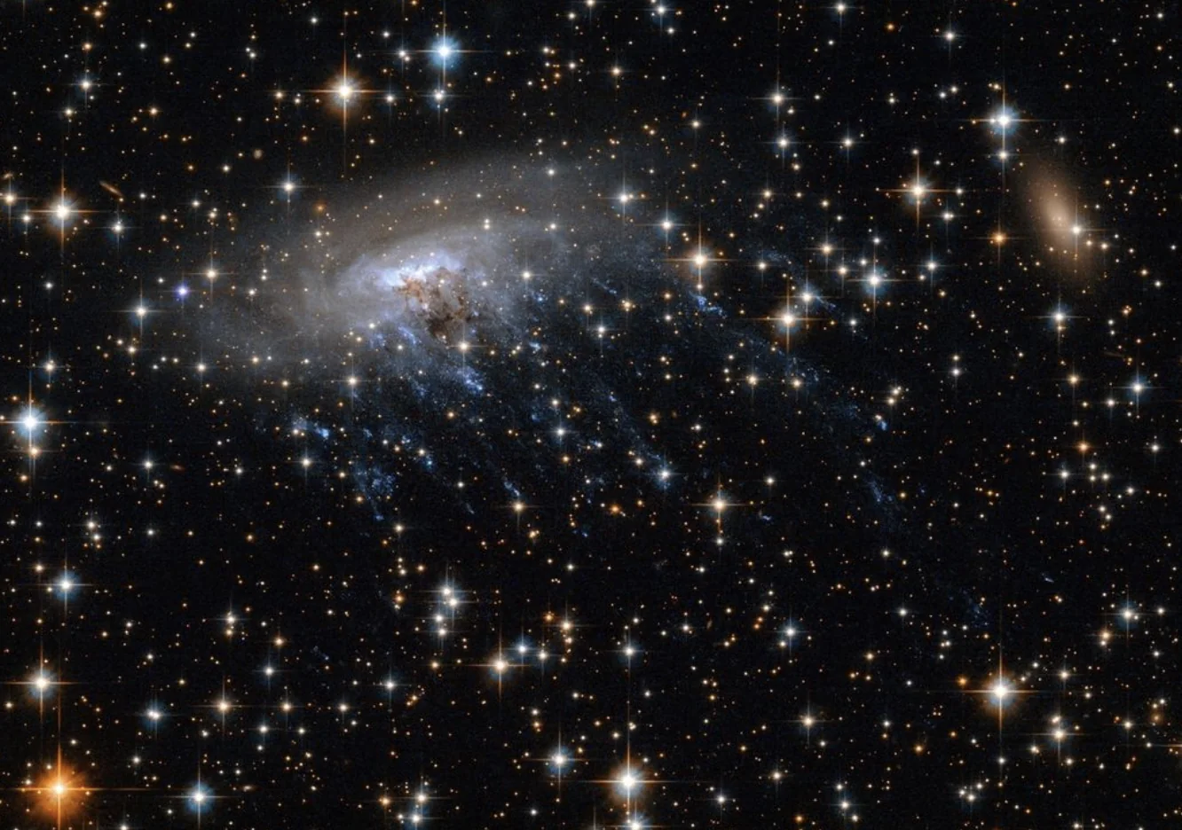 Удивительное изображение галактики ESO 137-001 показали ученые